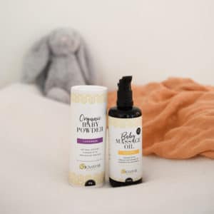 Baby Powder And Oil With Baby Stuffed Rabbit And Blanket